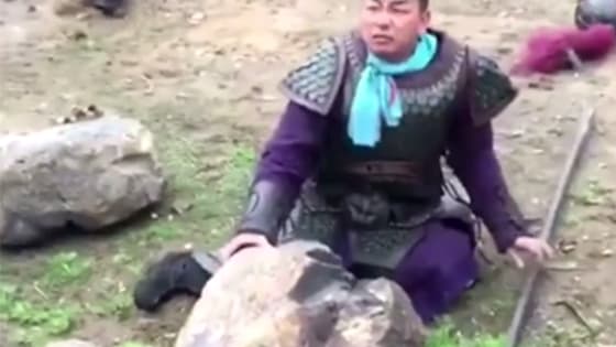 His friends tricked him into kicking a real rock!