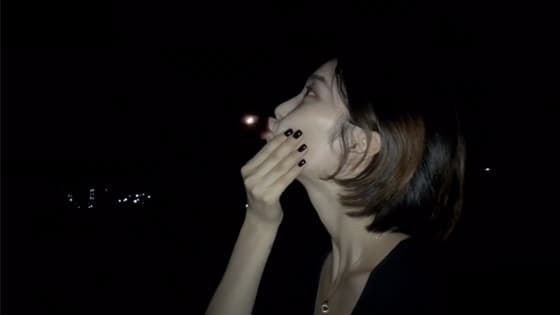 The girl ate the moon in the sky and spit it out actually