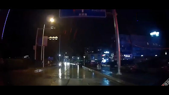 Dark, rainy night, please slow down when driving
