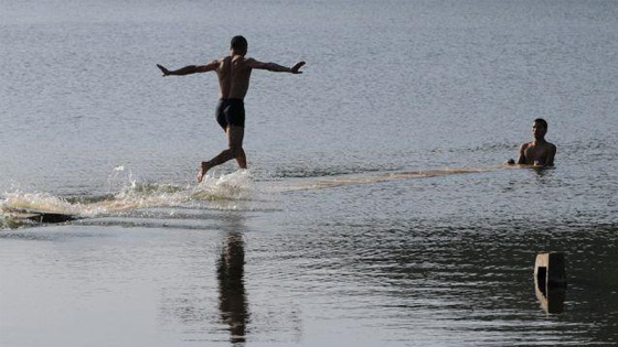 The man can actually walk on the water.