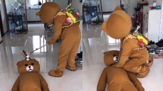 Two teddy bears were playing golf at home,and an accident happened..