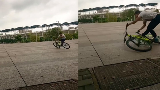 This man is showing off his excellent biking skills.