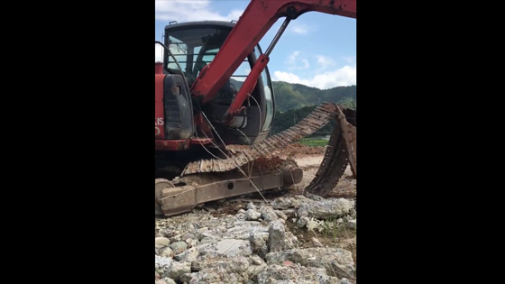 Have you ever seen an excavator attach a track to itself?