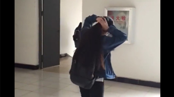  The girl is going to show her long hair in front of her friends.Then something happened.