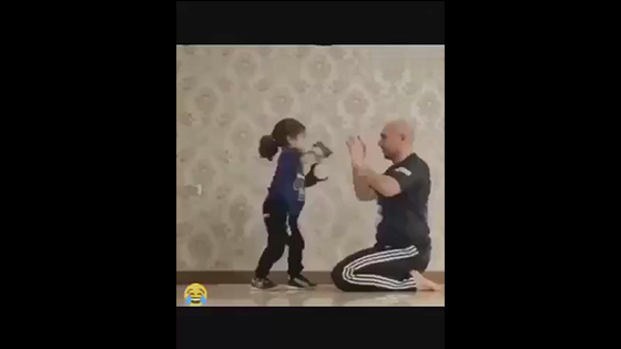 Shock! A girl actually punches and kicks her father