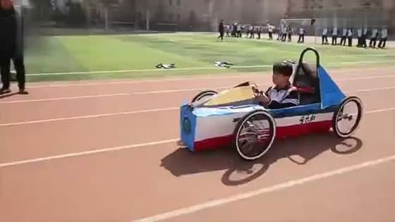 A green energy car made by seven junior high school students,it can run 20km at a time!