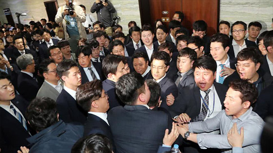 More than 300 south Korean lawmakers worked with crowbars and hammers in a parliamentary 