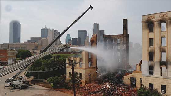 Ambassador Hotel in Dallas fire and Crews demolish facade of Ambassador.
