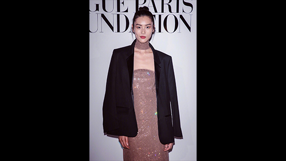 Liu Wen wears a nude rhinestone skirt outside suit and silhouette suit in VOGUE Foundation dinner.