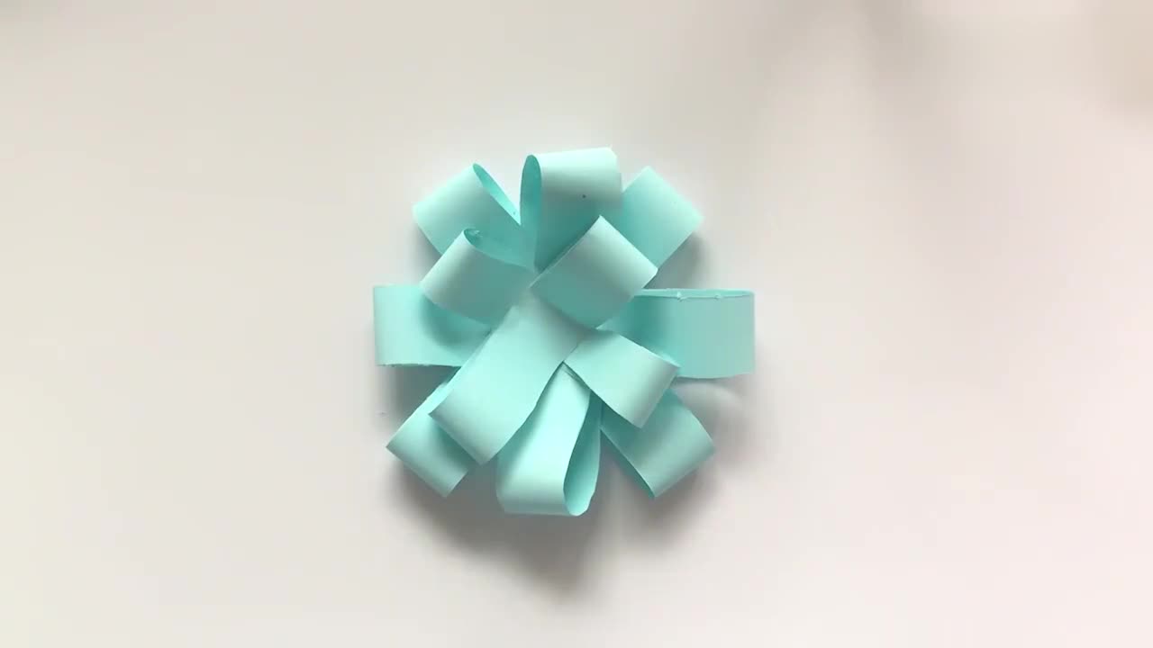 Teach you how to make beautiful bows with A4 paper. It's very simple. It's used to decorate gift boxes.