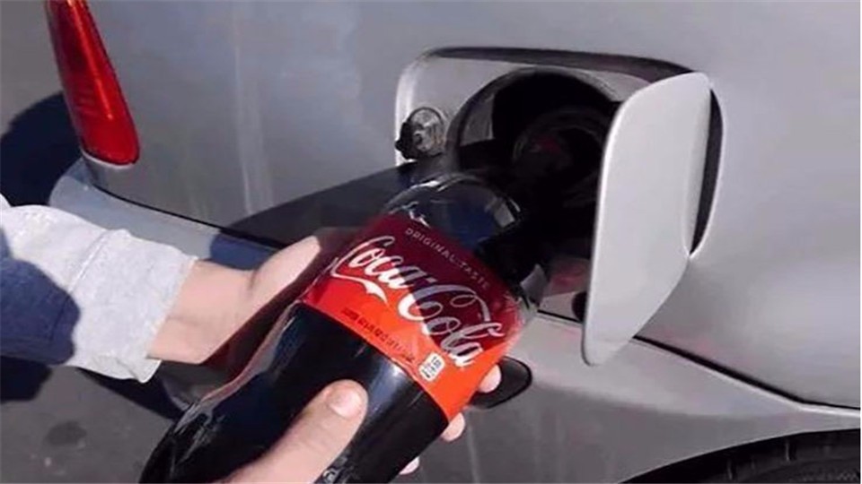 What happens when you pour a 2 liter bottle of Coke into the fuel tank of a BMW?