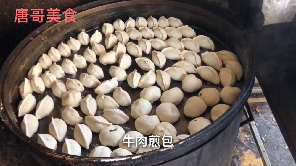Actual photo of Jiaxiang famous beef fried bread in Jining, one yuan a day, customers queue up to buy