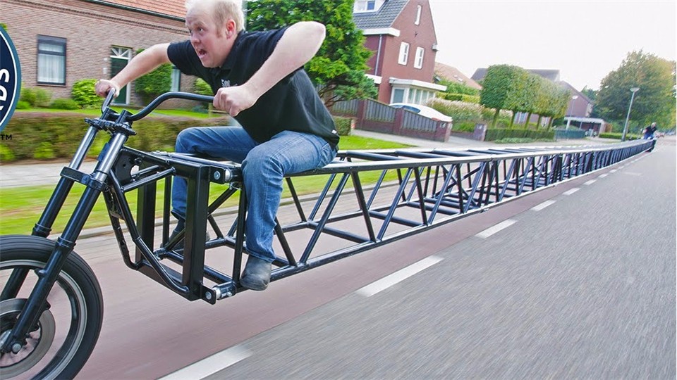 How do you turn a bicycle 50 meters long that breaks the Guinness record?