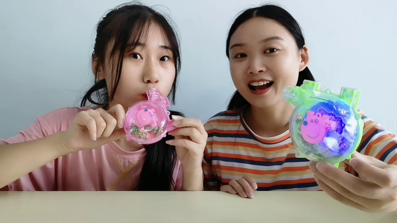 Two of them eat "pig piggy snacks", whistle, light, and sweet candy.