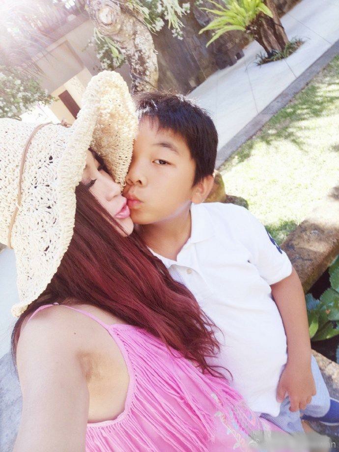 Irene Wan took a photo with her 10-year-old adopted son