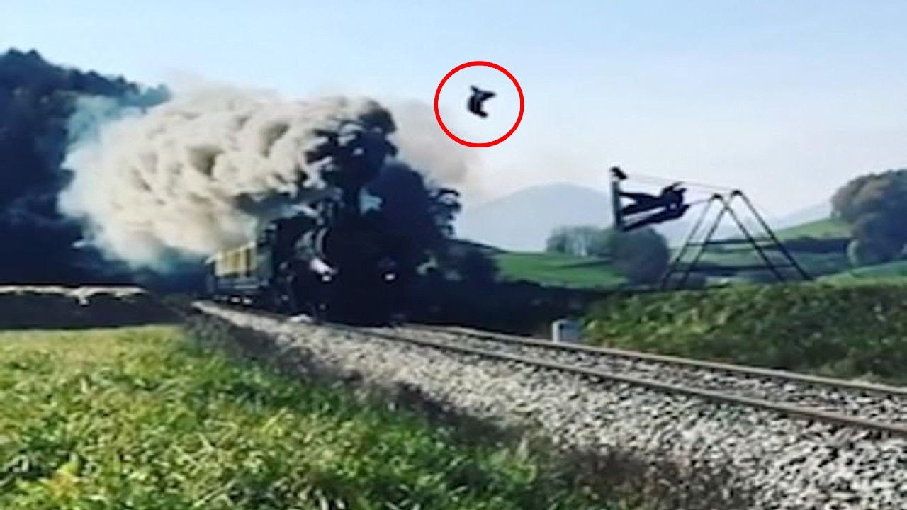 A Cowman swings over a speeding train and flips through the air to see people sweating.