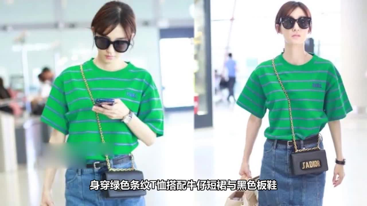 Wang Likun Green T with denim skirt is fresh and full, plain skin and fair temperament is good.