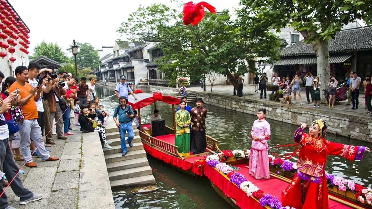 The most famous ancient town in Zhejiang, known for its silk trade, is also listed as a world heritage site.