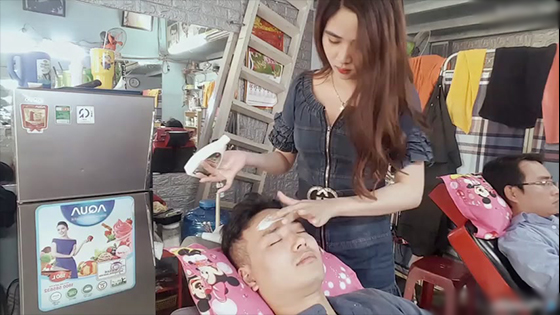 Vietnamese special haircut massage and shave- The lady is very beautiful